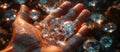 Gems in the hand in close-up against the background of a handful of rough diamonds. Panoramic banner