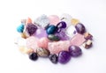 Gems of various colors. Geode amethyst, rose quartz, agate, apatite, aventurine, olivine, turquoise, aquamarine, rock crystal on Royalty Free Stock Photo