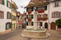 Gemsberg fountain and colorful buildings in Basel Royalty Free Stock Photo