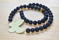 Gemstone black lava necklace with gold butterfly