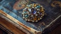 Gemstone Brooch on Antique Book Cover Royalty Free Stock Photo