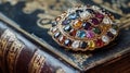 Gemstone and Gold Brooch on Antique Leather Book Royalty Free Stock Photo
