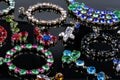 Gemstone jewelry on black glossy table