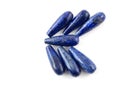 Gemstone natural lapis lazuli on white background, beads Royalty Free Stock Photo