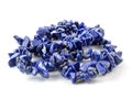 Gemstone natural lapis lazuli on white background, beads Royalty Free Stock Photo