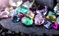 Gemstones collection jewelry set photo with black stone and dark lighting Royalty Free Stock Photo