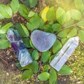 Gemstones fluorite, quartz crystal and various stones. Magic rock for mystic ritual, witchcraft Wiccan and spiritual healing on Royalty Free Stock Photo