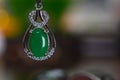 Gemstones jewelery Is a white gold pendant necklace. Set with diamonds and Green jade, rare, Royalty Free Stock Photo