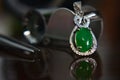 Gemstones jewelery Is a white gold pendant necklace. Set with diamonds and Green jade, rare, Royalty Free Stock Photo