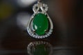 Gemstones jewelery Is a white gold pendant necklace. Set with diamonds and Green jade, rare,