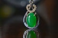 Gemstones jewelery Is a white gold pendant necklace. Set with diamonds and Green jade, rare,