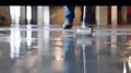 Genarative AI Worker, coating floor with self-leveling epoxy resin