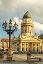 Gendarmenmarkt, German Cathedral in evening light at sunset with clouds