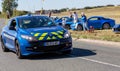 Gendarmerie patrol on a country road in escort during the tour de france cyclist