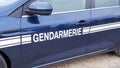 Gendarmerie sign is french police isolated on a car