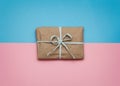 Gender determination day concept. Gift box. Pink and blue backgrounds. Girl or boy. Parcels wrapped in craft paper. Boy or girl.