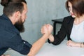 Gender equality leadership man woman armwrestling Royalty Free Stock Photo