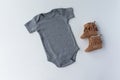 Gender Neutral Grey Baby Bodysuit & Shoes - Unisex Baby Clothing Mockup