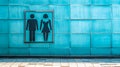 Gender Neutral Restroom Sign on Blue Tiled Wall Exterior Royalty Free Stock Photo