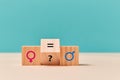 Gender, sexual equality. Human rights. Wooden cubes with feminism and masculism symbols, question mark and equal sign Royalty Free Stock Photo