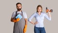 Gender stereotypes and non female profession. Serious man in apron and rubber gloves holding sponges and woman holding a