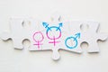 Gender symbols on a puzzle close up Royalty Free Stock Photo