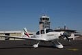 Cirrus SR 22 from Emirates Flight Training Academy parked at the apron Royalty Free Stock Photo