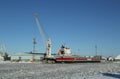 General cargo ship Eemsborg docked in Port Kemi in frozen Baltic Sea