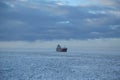 General cargo ship Eemsborg in frozen Baltic Sea near Kemi, Finland