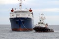 Tug pulling of general cargo vessel for enter in port