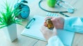 General practitioner holding unlabeled bottle of various pills a