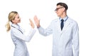 general practitioners in white coats giving highfive Royalty Free Stock Photo