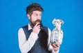 General savings tips. Man bearded hipster hold jar full of cash. Keeping cash issues. Businessman with his dollar Royalty Free Stock Photo