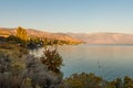 Sunrise views of the shores of Chelan Lake, Washington, USA. Royalty Free Stock Photo