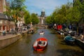 Amsterdam River and a boat.