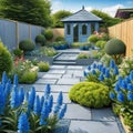 general view of back garden with artificial grey paving slab flower bed with