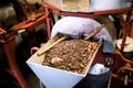 general view of cocoa seeds in grinding machine