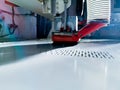 General view of a factory CNC machine cutting through Polyethylene