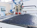 General view of a factory CNC machine cutting through Polyethylene