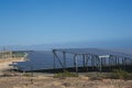 General view from the side of an electric power plant with solar panels. Royalty Free Stock Photo