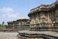 General view of view from the West. Chennakeshava temple complex, Belur, Karnataka. The wall of Veeranarayana temple on the right