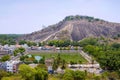 General view of Vindhyagiri hill temple complex, Sravanabelgola, Karnataka. View from Chandragiri hill. Large Belgola, white pond, Royalty Free Stock Photo