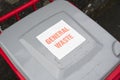 General waste red recycle wheelie bin with grey lid