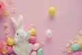 Happy easter bouquet Eggs Easter Bunny Goodies Basket. White cottontail Bunny Orange Sorbet. Easter vigil background wallpaper Royalty Free Stock Photo