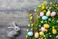 Happy easter radiating happiness Eggs Easter Basket. White peach Bunny personalized greeting. Whiskers background wallpaper Royalty Free Stock Photo