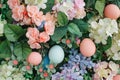 Happy easter text area Eggs Easter Bunny Plates Basket. White hijinks Bunny Seasonal bloom. Orange Cream background wallpaper Royalty Free Stock Photo