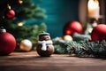 A Rustic Wooden Table With Snowman And A Pine Tree In The Blur Background Royalty Free Stock Photo