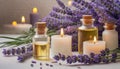 Spa items. Beauty background with glass bottles of essential oils, candles and lavender on white wooden table. Royalty Free Stock Photo