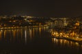 Night view of Douro river and Porto city, Portugal. Royalty Free Stock Photo