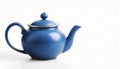 Blue teapot on white background with copy space Royalty Free Stock Photo